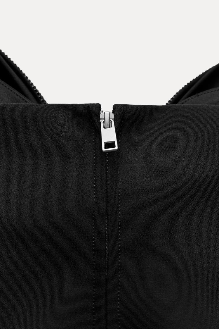 Liora – Sparkling Cropped Top with Bow Detail